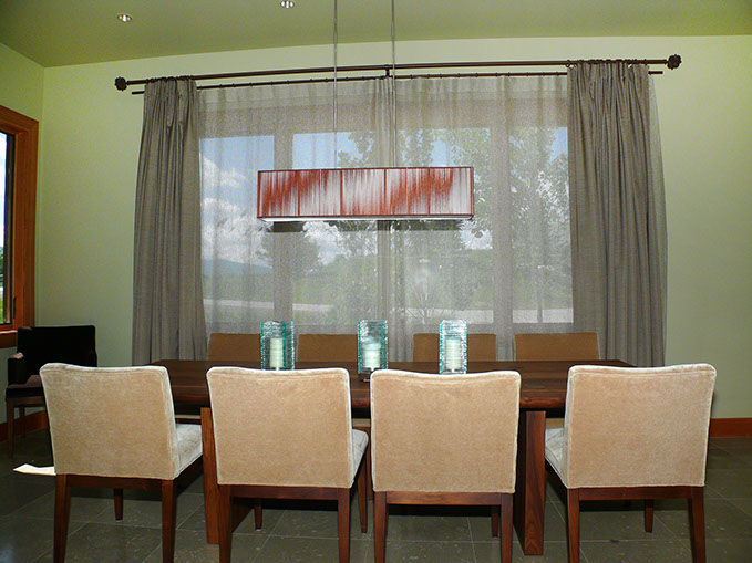 sandy drapes, seat cushions, striped, tan trending pillows and fabrics. vignettes close up view, bright pillows