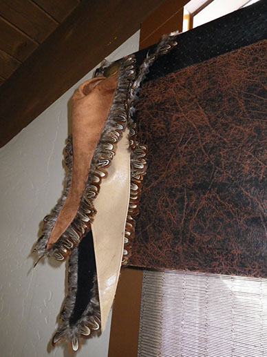 Soft valances  and cornice boards, red shades and wood